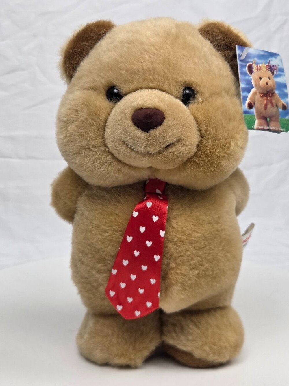 vintage Canterbury England Teddy Bear plush holding rose in back 9"